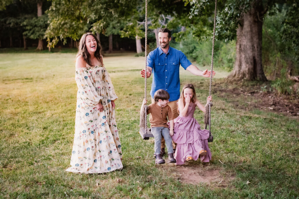Family at tree swing during photo session